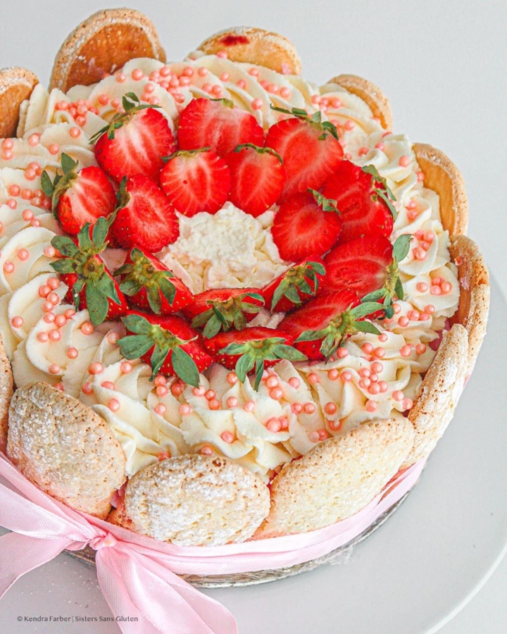pink charlotte cake with strawberries
