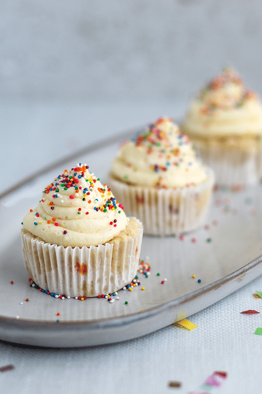 Microwave Confetti Cupcakes by @klean.kate close up showing 3 cupcakes