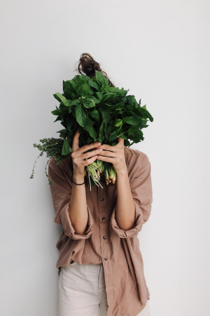 lady holding spinach