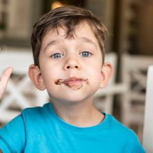 healthy desserts kids will love - child with pudding on his face
